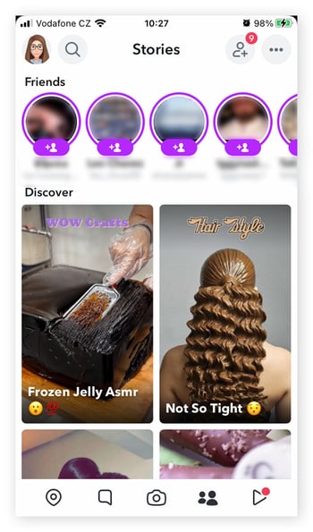 The Discover homepage on Snapchat, with small circular profile pictures on top and large rectangular previews in the middle
